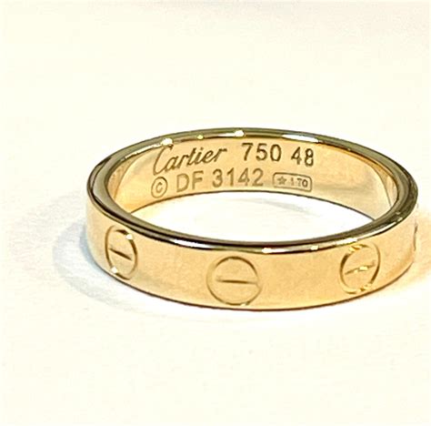 cartier 750 ring 52833a 3 diamonds|cartier love ring 750 52833a.